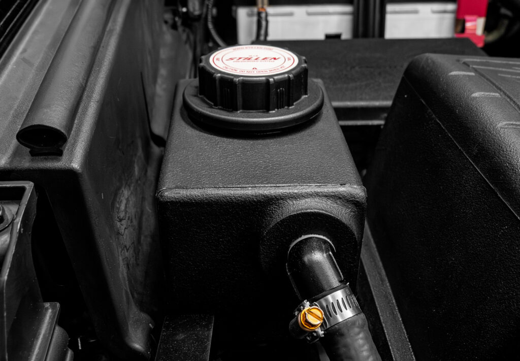 Installed STILLEN intercooler reservoir relocation kit in Toyota Tundra engine bay